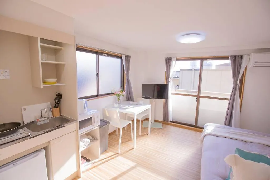 閑静な住宅街_暖かく居心地の良いデザイン Sow-2 Tokio Apartament
